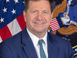 Jay Clayton. Officieel portret ODNI, augustus 2026; archiefpublicatie 7 augustus 2026. Publiek domein. https://commons.wikimedia.org/wiki/File:Official_portrait_of_Jay_Clayton_(2026).jpg